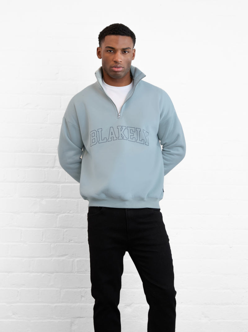 Outline Varsity 1/4 Zip Up Jumper - Mineralblau