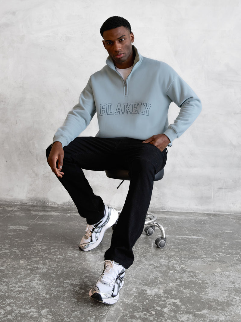 Outline Varsity 1/4 Zip Up Jumper - Mineralblau