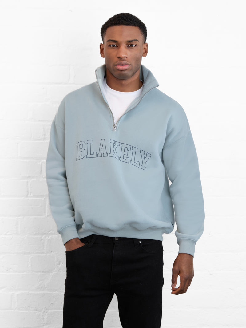 Outline Varsity 1/4 Zip Up Jumper - Mineralblau