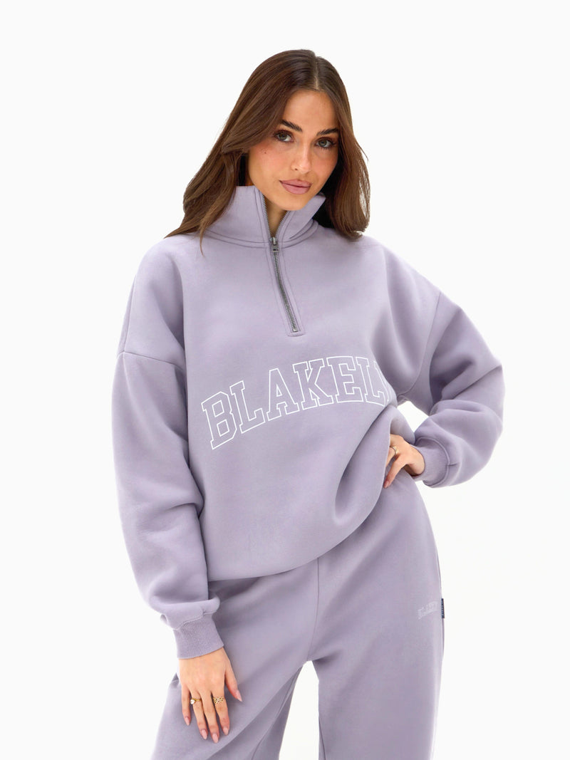 Outline Varsity 1/4 Zip Jumper - Gewassen lila