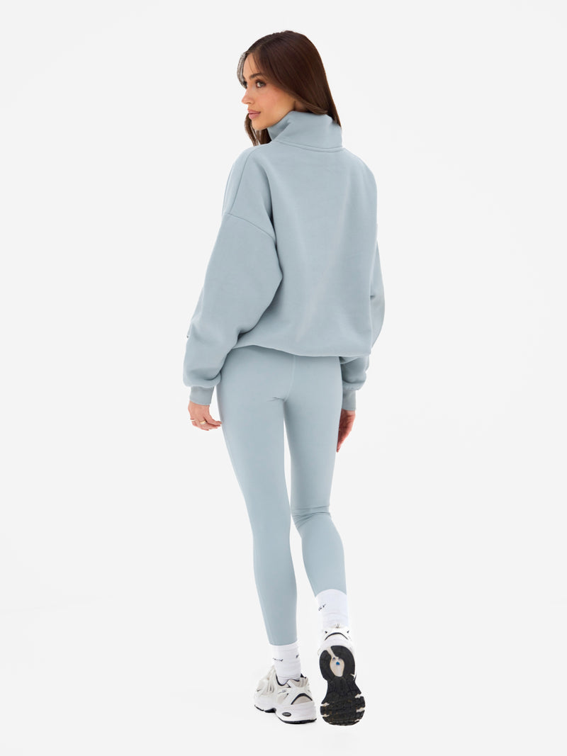Outline Varsity 1/4 Zip Jumper - Mineraalblauw