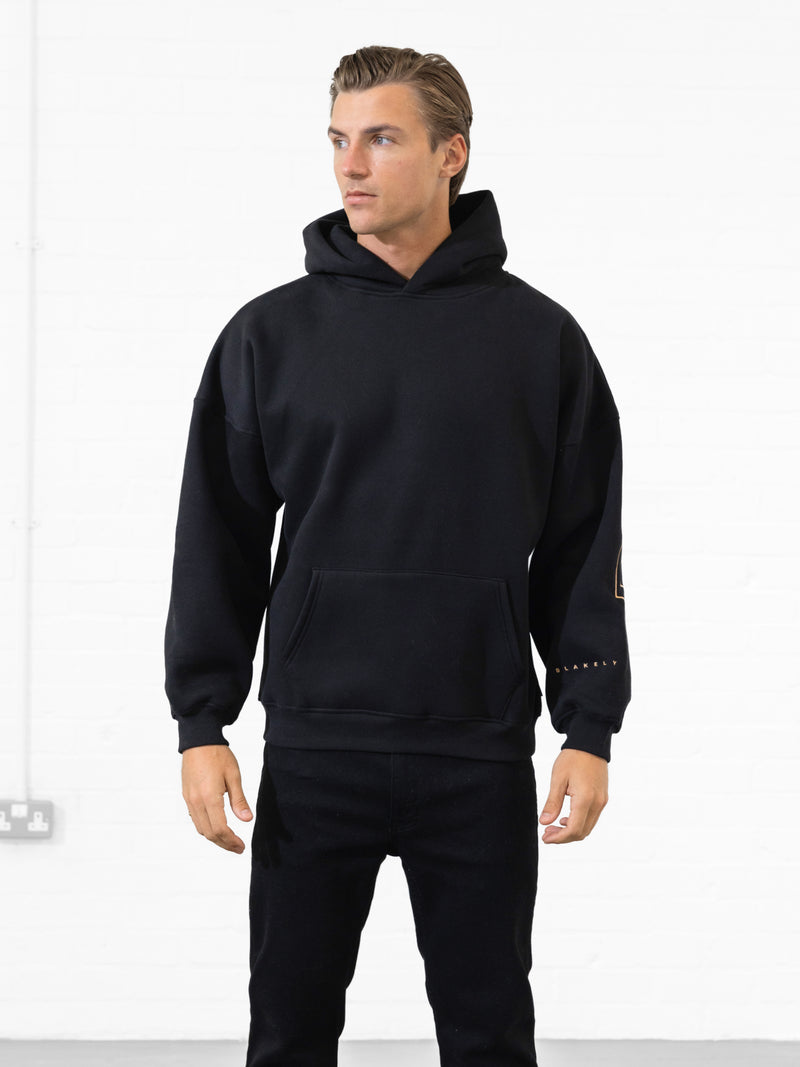 Embroidered Idris Oversized Hoodie - Zwart & Goud
