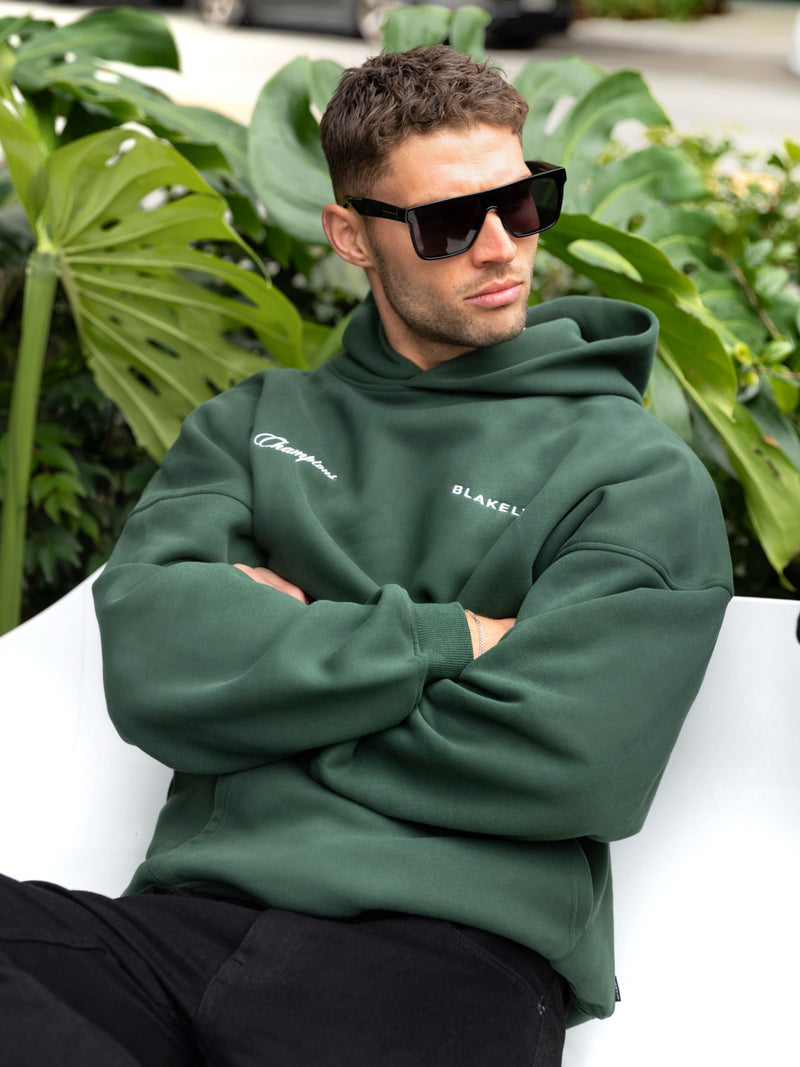 Champions Legacy Relaxed Hoodie - Forest Green